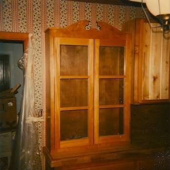 Hovick Design - a wooden cabinet with glass doors - General Contractors Near Me - Sand City, California Hovick Design - a wooden cabinet with glass doors - General Contractors Near Me - Sand City, California