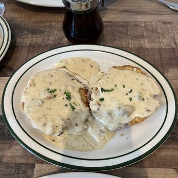 Mirabella's Table - Biscuits and gravy; biscuits are so flakey and buttery - Breakfast & Brunch Near Me - Rogers, Arkansas
