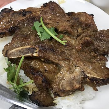 Bo Ky - BBQ Porkchops over rice - Chinese Near Me - New York, New York Bo Ky - BBQ Porkchops over rice - Chinese Near Me - New York, New York