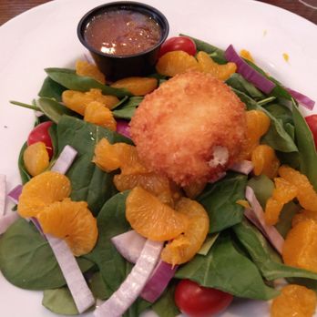 Starfire Grill - Spinach goat cheese fritter salad ($11.50). Very small salad, no meat or seafood on it. Disappointing. - Desserts Near Me - Florence, South Carolina Starfire Grill - Spinach goat cheese fritter salad ($11.50). Very small salad, no meat or seafood on it. Disappointing. - Desserts Near Me - Florence, South Carolina