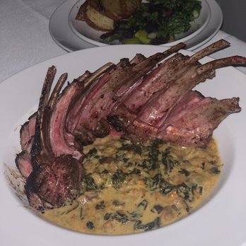 Parlor House Bistro - Rack of lamb (cooked/seasoned perfectly) with a sauce that had kale in it but can't remember what else. I could just eat of bowl of this! - New American Near Me - Dunedin, Florida Parlor House Bistro - Rack of lamb (cooked/seasoned perfectly) with a sauce that had kale in it but can't remember what else. I could just eat of bowl of this! - New American Near Me - Dunedin, Florida