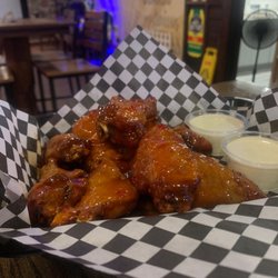 The Midway - Sweet chili wings . Wing Wednesday $.75 as of March 2023. Try the sriracha  bourbon , if you like a little kick.
