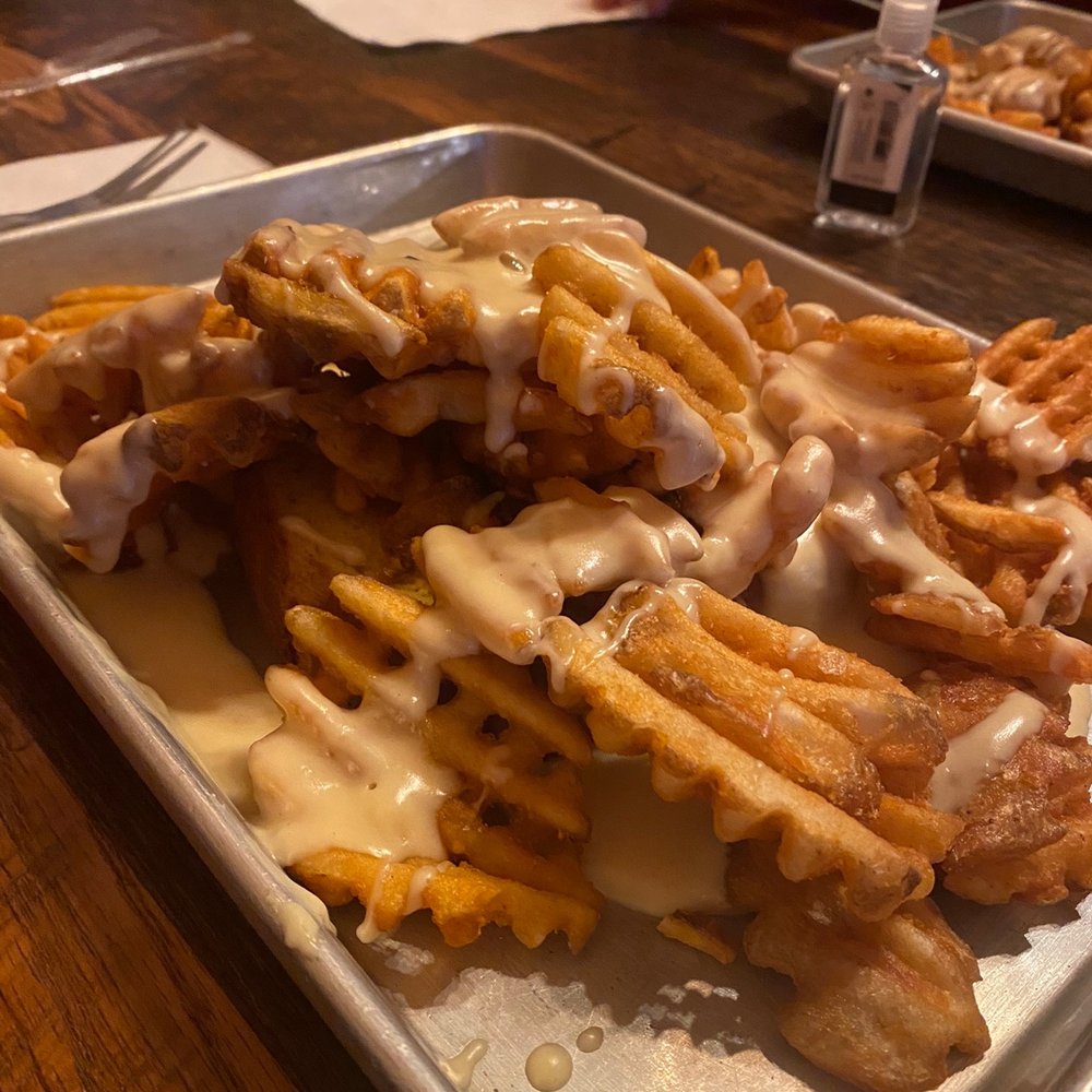 Stagecoach - Ponyshoe with seasoned waffle fries, grilled Buffalo chicken breast, cheese sauce & Texas toast - American Near Me - Lockport, Illinois