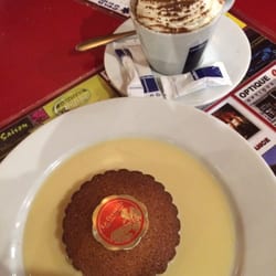 Domespace Grill - Local special almond cake with vanilla sauce and cappuccino