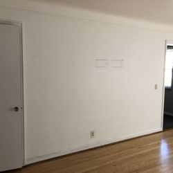Garfield Avenue Apartments - Another front room doors that doesn't close without room.