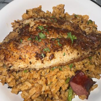Iberville Cuisine - Jambalaya with grilled fish instead of fried - New American Near Me - New Orleans, Louisiana Iberville Cuisine - Jambalaya with grilled fish instead of fried - New American Near Me - New Orleans, Louisiana