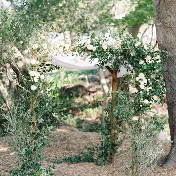 Root 75 - Incredible chuppah. We asked her to make it look like it had been overgrown with greenery and flowers. She nailed it! - Florists Near Me - Coronado, California