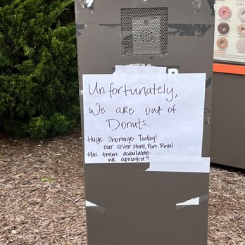 Dunkin' -  a sign posted on a refrigerator - Donuts Near Me - Spring Hill, Tennessee