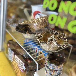 The Big Moo Ice Cream Parlor - Behind the glass