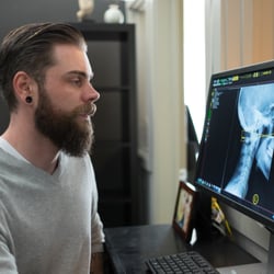 Upper Cervical Chiropractic of Marin - Dr. Tremayne analyzing Upper Cervical Specific X-Rays