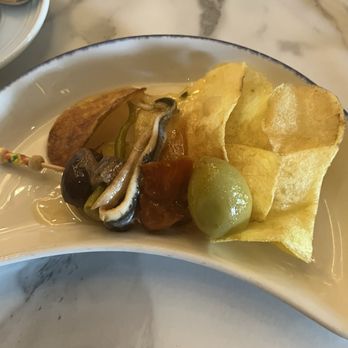 Patio de Leones - Anchovy with olives and chips - Tabernas Near Me - Madrid, M Patio de Leones - Anchovy with olives and chips - Tabernas Near Me - Madrid, M