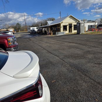Mama Jean's - My Lexus parked in their conveniant parking lot with their brick-and-mortar restaurant in the background. - Barbeque Near Me - Roanoke, Virginia