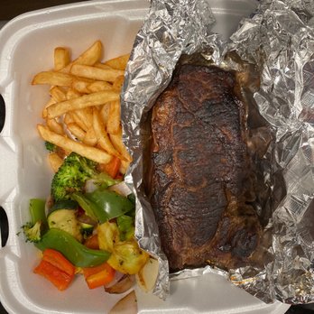 Puffin's Restaurant - NY steak Strip Well Done! ( We already hate half the fries before taking the photo) - New American Near Me - Millbury, Massachusetts