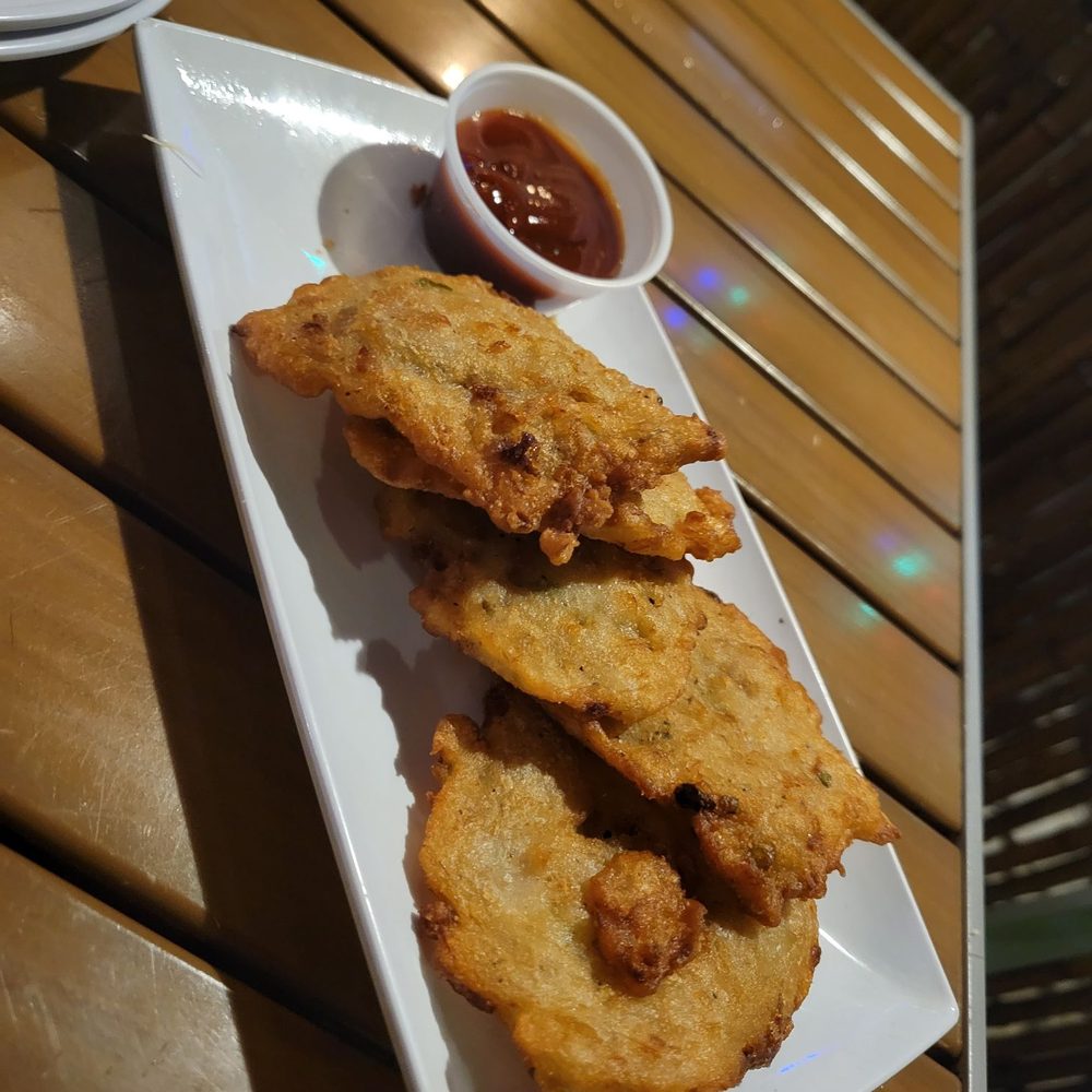 Pepper's Bar & Grill - Saltfish fritters - Bars Near Me - George Town, UM Pepper's Bar & Grill - Saltfish fritters - Bars Near Me - George Town, UM