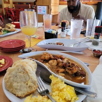 Ruby Slipper Metairie - Shrimp and grits with a scrambled egg. - Breakfast & Brunch Near Me - Metairie, Louisiana Ruby Slipper Metairie - Shrimp and grits with a scrambled egg. - Breakfast & Brunch Near Me - Metairie, Louisiana