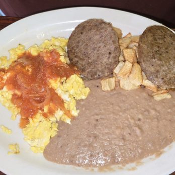 The Palms - Breakfast plate, scrambled eggs with salsa, refried beans, potatoes and sausage patties - Mexican Near Me - Seguin, Texas The Palms - Breakfast plate, scrambled eggs with salsa, refried beans, potatoes and sausage patties - Mexican Near Me - Seguin, Texas
