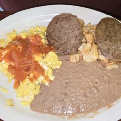 The Palms - Breakfast plate, scrambled eggs with salsa, refried beans, potatoes and sausage patties