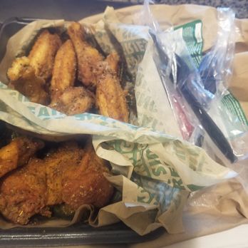 Wingstop - No idea why I need 3 forks or ketchup for chicken but grateful for the extra wing :) - Chicken Wings Near Me - Kenner, Louisiana