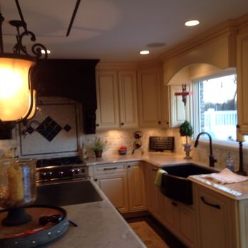 Bay Home Improvements - a kitchen with a sink and a stove - General Contractors Near Me Bay Home Improvements - a kitchen with a sink and a stove - General Contractors Near Me