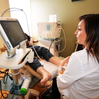 DM Foot & Ankle Associates - Dr. Emini using our ultrasound machine. - Podiatrists Near Me - Lemont, Illinois DM Foot & Ankle Associates - Dr. Emini using our ultrasound machine. - Podiatrists Near Me - Lemont, Illinois