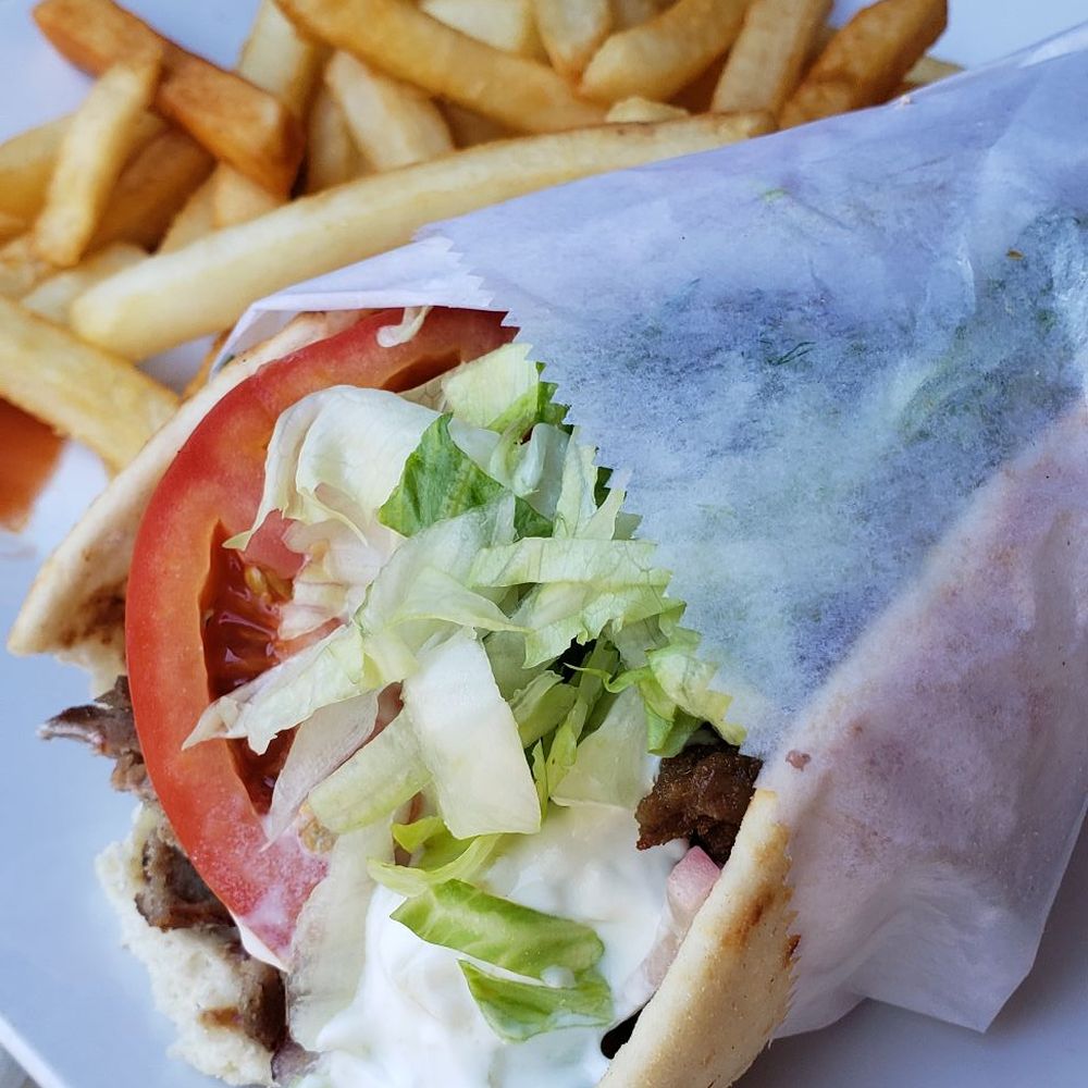crispy fries and a loaded gyro crispy fries and a loaded gyro