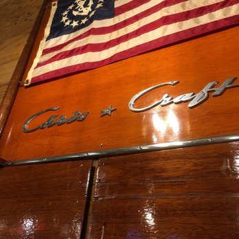 Catch 22 Bistro - Chris craft panel with flag. - Seafood Near Me - Algonac, Michigan Catch 22 Bistro - Chris craft panel with flag. - Seafood Near Me - Algonac, Michigan