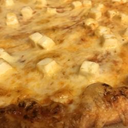 Pizzatori - Pizza with cheese.