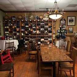 Gianna Italian Kitchen - Wine selection wall in front dining area