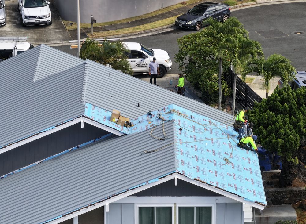 Slide of Gold Pacific Roofing