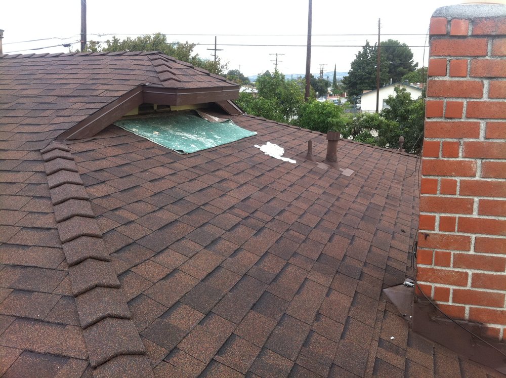 Slide of The Local Friendly Roofer