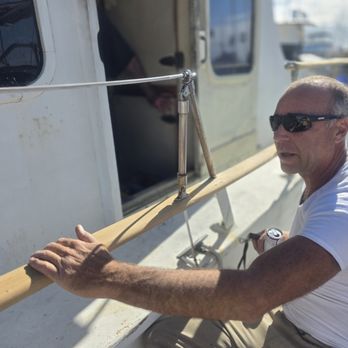 Ventura Boat Services - Cam has the teak railing is sanded down and ready for 20 coats of marine varnish - Boat Repair Near Me - Oxnard, California