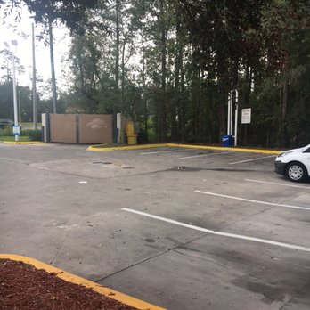 Kangaroo Express - a white car parked in a parking lot - Gas Stations Near Me - Jacksonville, Florida Kangaroo Express - a white car parked in a parking lot - Gas Stations Near Me - Jacksonville, Florida