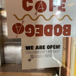 Arrow Bodega - Sigh on door