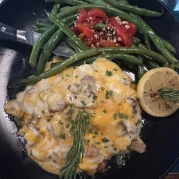 Chicken with green beans smothered in bacon and cheese