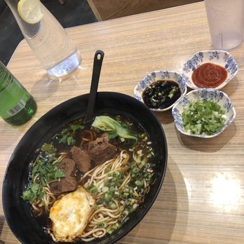 Mr.Dumpling - Beef noodle soup(spicy)($8.45) with egg(+$1.00) and sriracha, green onions, and chef sauce on the side. - Chinese Near Me - Rancho Cucamonga, California Mr.Dumpling - Beef noodle soup(spicy)($8.45) with egg(+$1.00) and sriracha, green onions, and chef sauce on the side. - Chinese Near Me - Rancho Cucamonga, California