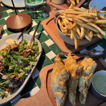 Valley Goat - Spiced fries, goat empanadas, and chicken skewers - New American Near Me - Sunnyvale, California Valley Goat - Spiced fries, goat empanadas, and chicken skewers - New American Near Me - Sunnyvale, California