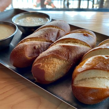 Avo - Soft pretzels with mustard creme and cheese sauce - Cocktail Bars Near Me - Rocky River, Ohio Avo - Soft pretzels with mustard creme and cheese sauce - Cocktail Bars Near Me - Rocky River, Ohio