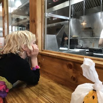 Noodle Man - A child enraptured with the noodle maker. - Noodles Near Me - Virginia Beach, Virginia
