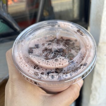 The North Bowl - a hand holding a cup of chocolate milkshake - Juice Bars & Smoothies Near Me - jersey city, New Jersey The North Bowl - a hand holding a cup of chocolate milkshake - Juice Bars & Smoothies Near Me - jersey city, New Jersey