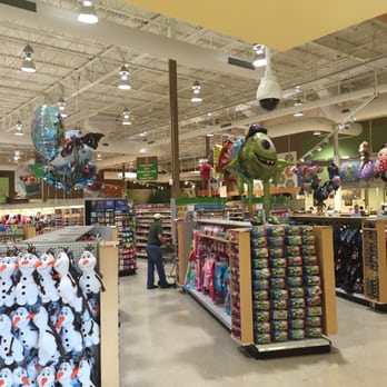 Publix - No Orlando grocery store is complete without at least 3 rows of cheesy souvenir t-shirts and stuffed Mickey dolls - Grocery Near Me - Orlando, Florida