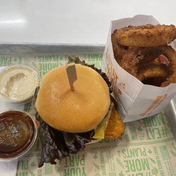 Next Level Burger - Fire Chik'n Burger* and Onion Rings* - Burgers Near Me - San Francisco, California