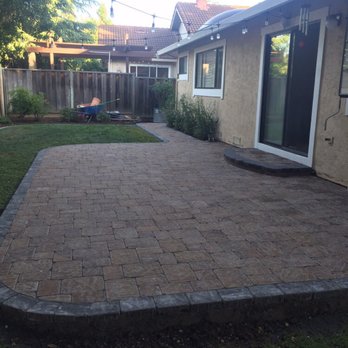 Brasmerica Paver systems - Back Patio - we extended the width about 18", and I love how they suggested doing the step at the slider! - Masonry/Concrete Near Me - Pinole, California