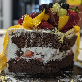 Diamond Bakery - Cross section of my family favorite cake! Famous Mango cake, customize with chocolate cake and strawberry fruit inside - Bakeries Near Me - Monterey Park, California