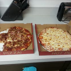 The Don's Pizza - Two pizza worlds collide. Left side meats, right side double cheese.