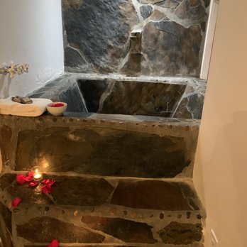 Korakia Pensione - The huge stone tub with a large open window to the right. - Hotels Near Me - Palm Springs, California Korakia Pensione - The huge stone tub with a large open window to the right. - Hotels Near Me - Palm Springs, California