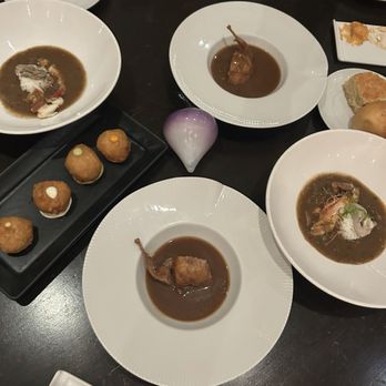 Restaurant R'evolution - Death by gumbo Beer-battered Crab Beignets Seafood Gumbo - Cajun/Creole Near Me - New Orleans, Louisiana Restaurant R'evolution - Death by gumbo Beer-battered Crab Beignets Seafood Gumbo - Cajun/Creole Near Me - New Orleans, Louisiana