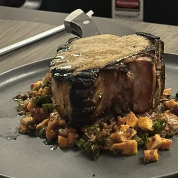 St. Amand Kitchen & Cocktails - Pork Chop with sweet potato hash - Cocktail Bars Near Me - Chandler, Arizona St. Amand Kitchen & Cocktails - Pork Chop with sweet potato hash - Cocktail Bars Near Me - Chandler, Arizona