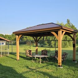 Wagging Tail Ranch - Dog park shelter and chairs