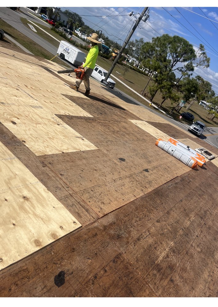 Slide of Ark Roofing and solar