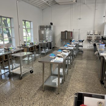 Bon Macaron Patisserie - a large kitchen with stainless steel tables - Bakeries Near Me - Vancouver, British Columbia Bon Macaron Patisserie - a large kitchen with stainless steel tables - Bakeries Near Me - Vancouver, British Columbia